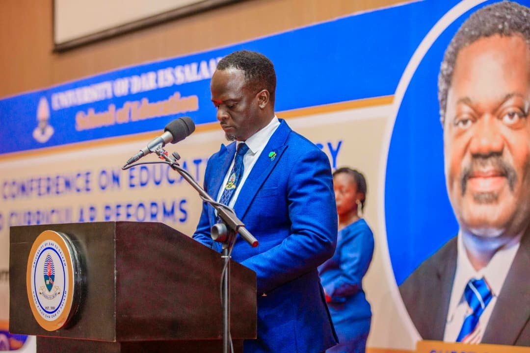 Dr. Reuben Ndimbo speaking at an event